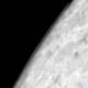 A portion of the moon Triton with a cloud from the eye of the Voyager 2 probe. Source: Wikipedia / Credit for the original image: NASA / Voyager 2